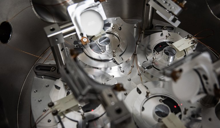 A view of the four sample trays inside the chamber.
