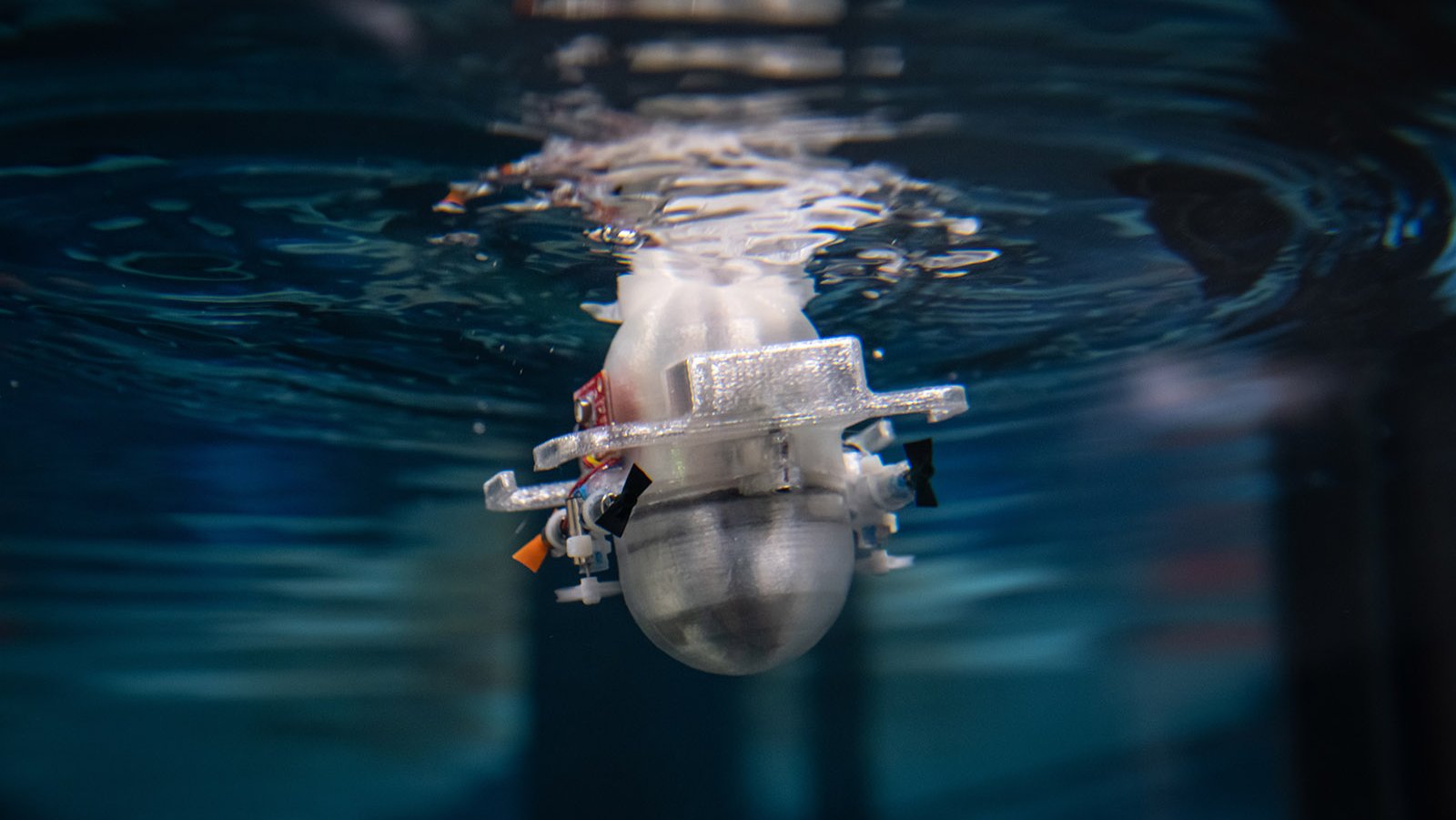 A photo of a device submerged in a pool