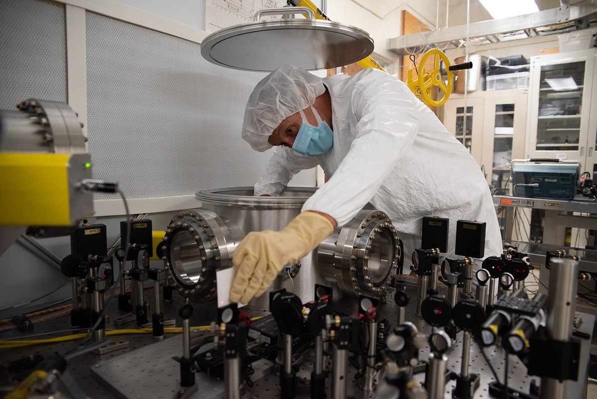 Researcher fine tunes the samples in the chamber.