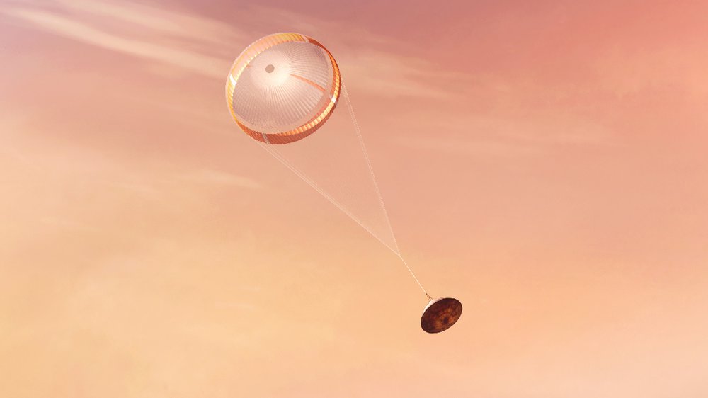 An artist&#x27;s rendering of a spacecraft descending through the Martian atmosphere on its parachute
