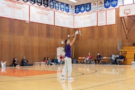 A student tests an airplane