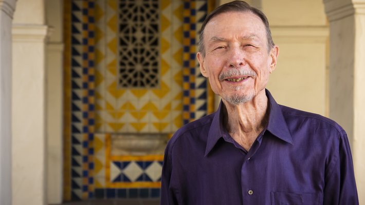 image of carver mead wearing a purple button down shirt
