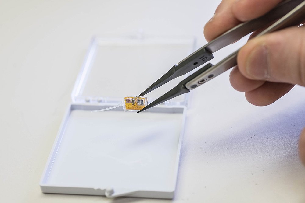 Implant being picked up