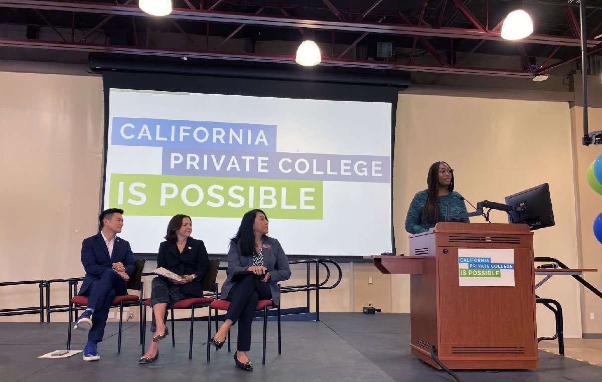 A woman speaks at a podium on a stage. To her left, three people seated in chairs look at her. On a screen behind them is a graphic reading "California private college is possible."