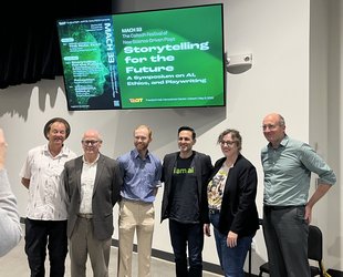 A person takes a photo of a group