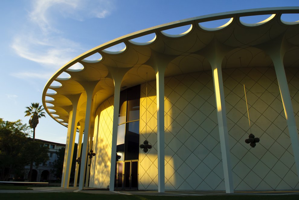image of exterior of beckman auditorium at sunset
