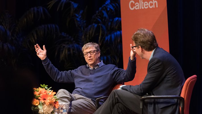 Image of Bill Gates speaking with Dean of Undergraduate Students Kevin Gilmartin