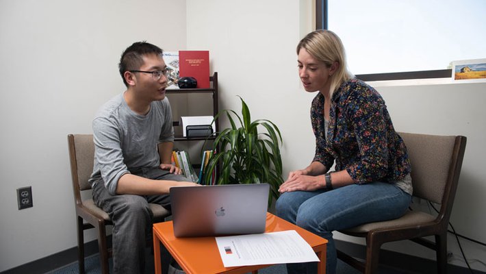 STEM writing specialist Christina Birch during a tutoring session with a student in the Hixon Writing Center.