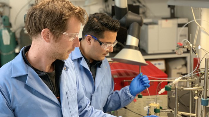 Researchers conduct laboratory work to convert carbon dioxide to ethylene.