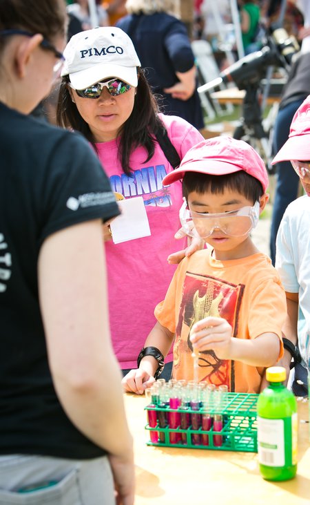 K-12 students, including Ethan Chin, above, got a chance to conduct a wide variety of experiments at the event.