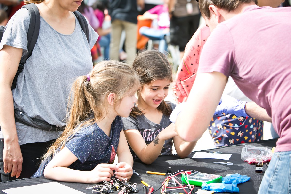 Alexa and Sasha Boronda were among thousands of visitors to participate in hands-on demonstrations and explore educational booths.