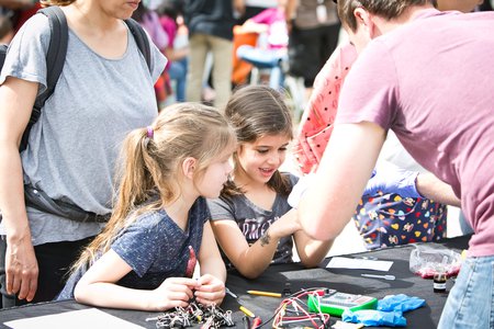 Alexa and Sasha Boronda were among thousands of visitors to participate in hands-on demonstrations and explore educational booths.