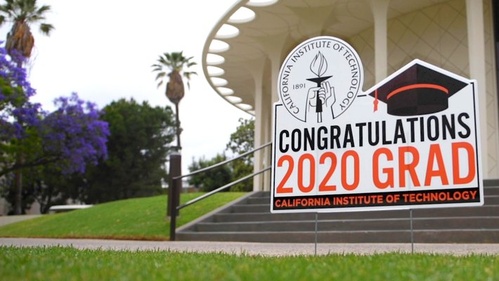 A sign in front of Beckman Auditorium offers congratulations to the Class of 2020.