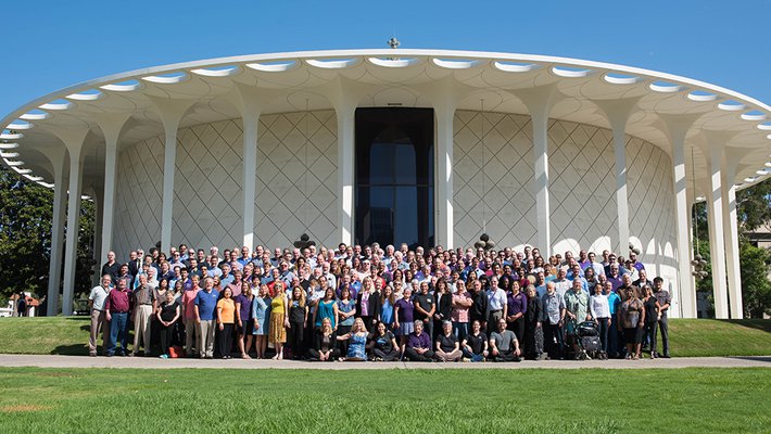Members of the Cassini science team gather in front of Beckman Auditorium.
