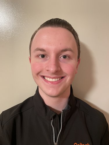 Christian Wyatt Cavener smiling at the camera