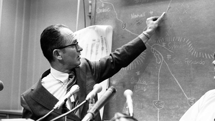 Clarence Allen answers questions about the San Fernando Earthquake during a press conference at the Seismological Laboratory on February 10, 1971.