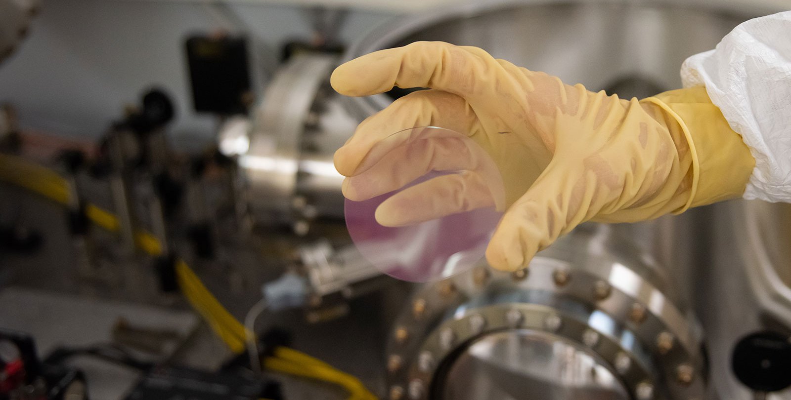 Pinkish mirror coating on a test disk.