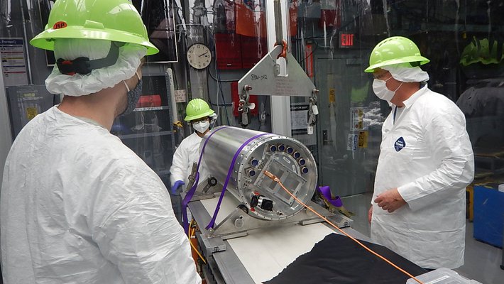 Richard Feder-Staehle, Chi Nguyen, and Rick Evavold of the CIBER-2 team working on the CIBER-2 payload.