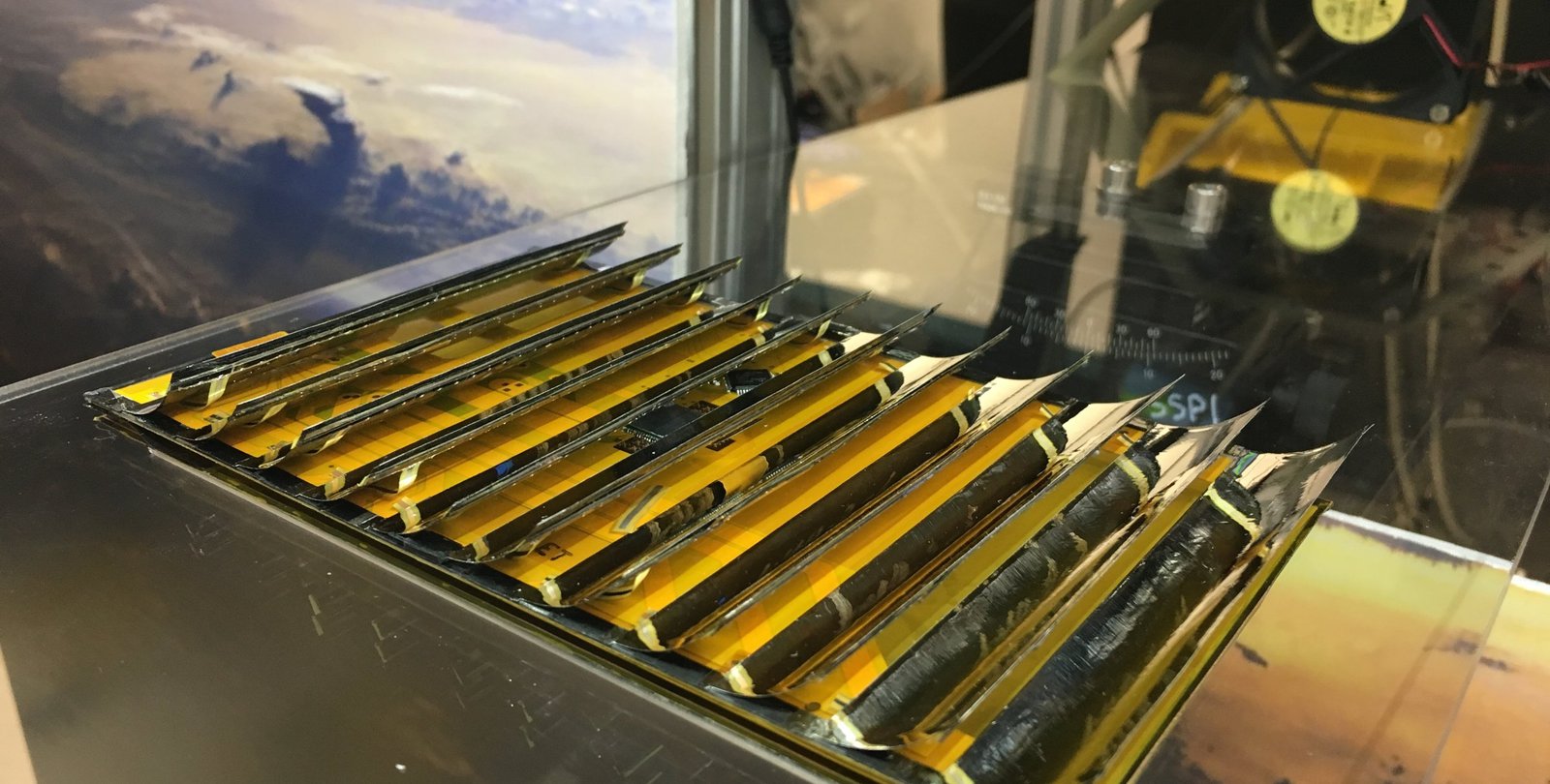 An array of small solar panels that are part of the Space Solar Power Project.