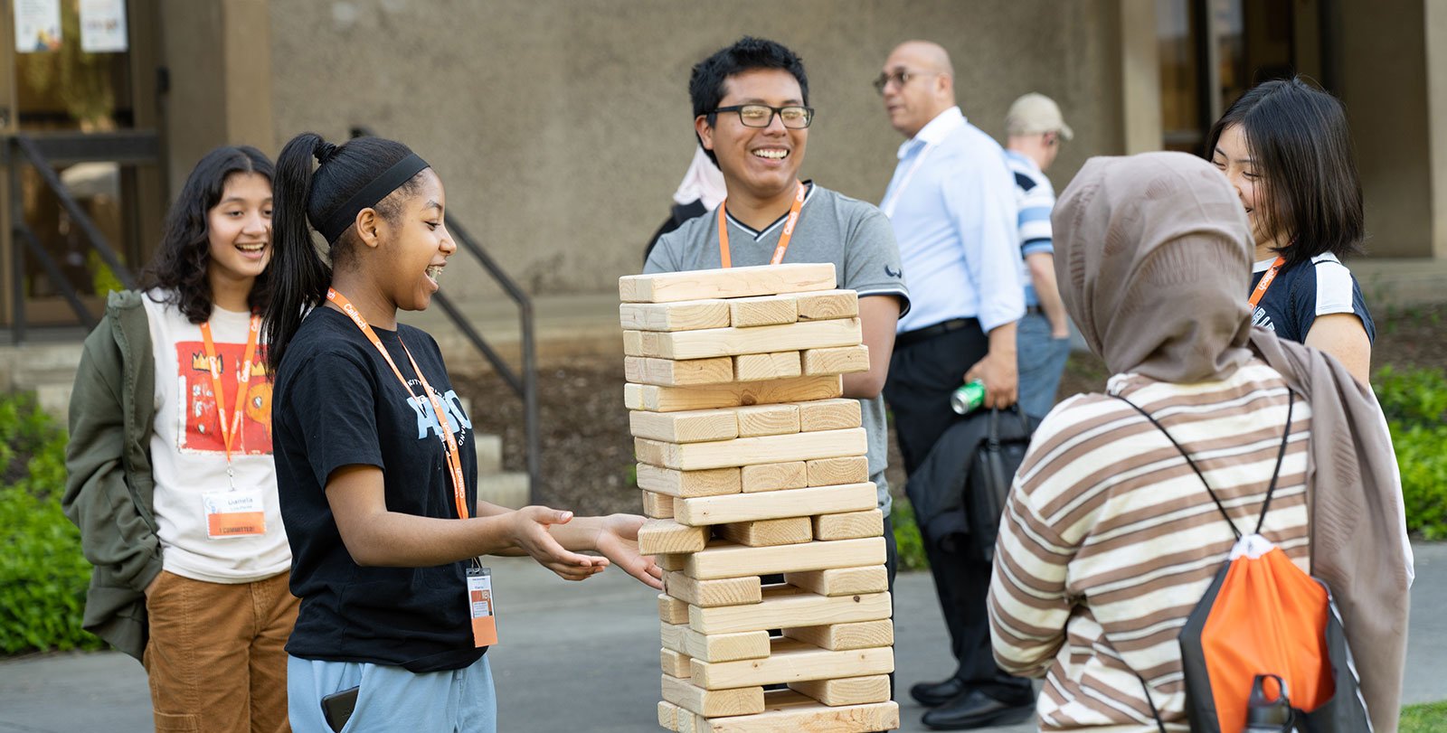 Students play a game of giant Jenga at DiscoTech