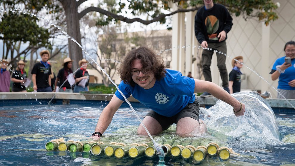 Third-year Joaquín Gómez paddles a raft across the Gene Pool.