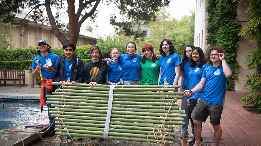 Members of "Avatar: The Last Stack" hold up their raft.