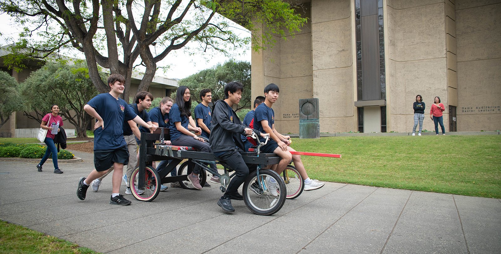 Students ride their "chariot" during Ditch Day.