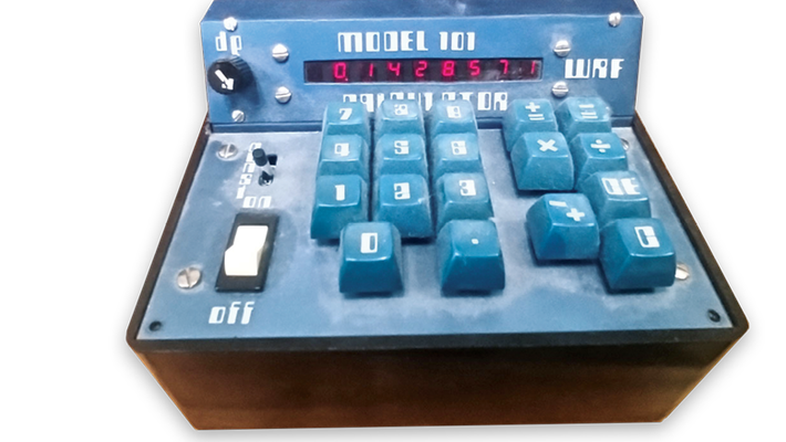 A retro blue DIY calculator that alum William Frensley (BS '73) built himself and keeps in his office.