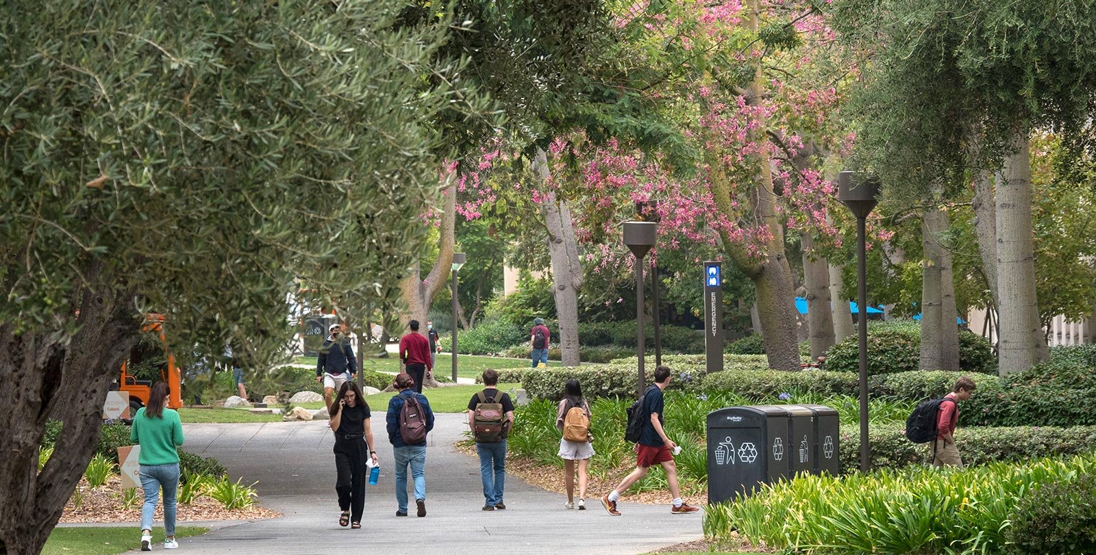 People walking around the Caltech campus.