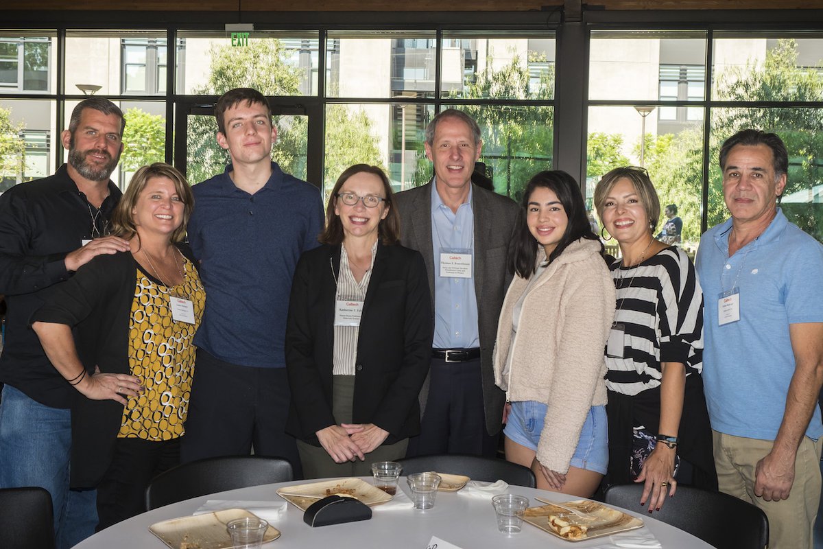 Families gather with President Thomas Rosenbaum and Professor Katherine Faber at Family Weekend.