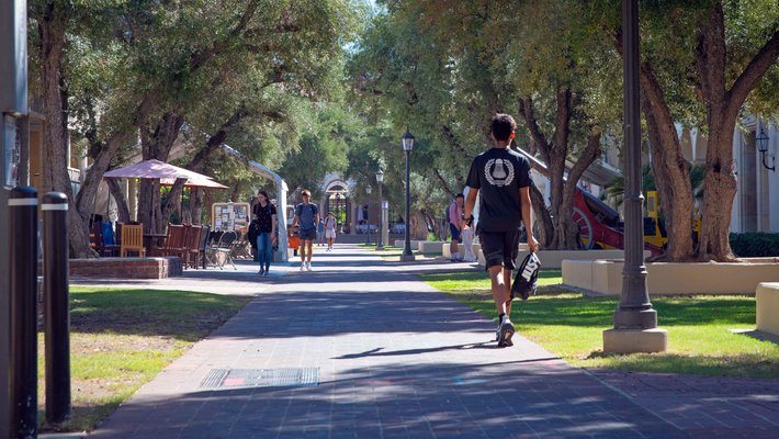 Students walk on campus as classes begin