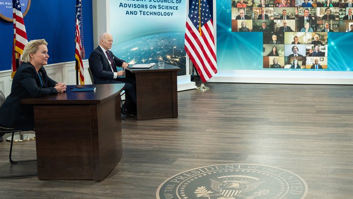 Frances Arnold at a PCAST meeting seated near President Joe Biden.