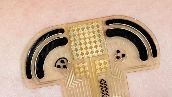 Small U-shaped device to detect substances in human sweat, designed to be worn on the wrist.