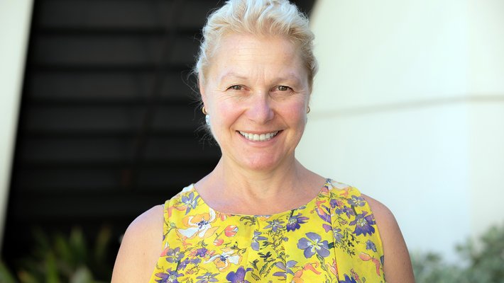 Julia Greer wearing yellow dress