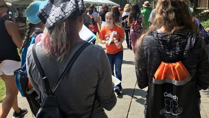 Caltech senior Madelyn Stroder leads a tour of prospective female students and their families at a Caltech Summer Preview event highlighting women in STEM on Friday, July 27.