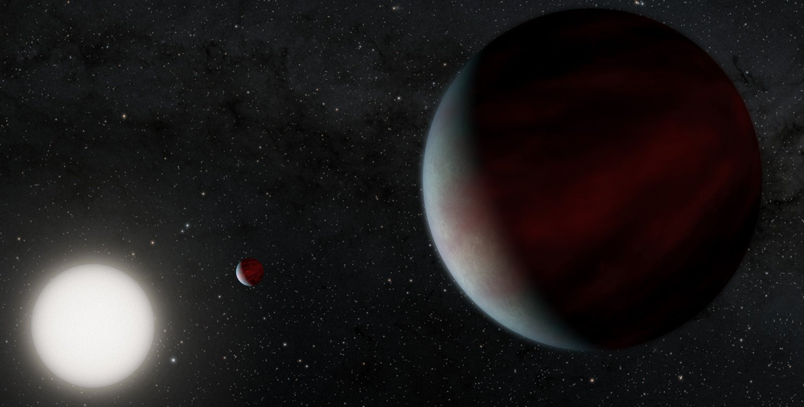 Artist's rendering of two Saturn-sized planets orbiting a Sun-like star.