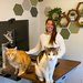 Kirby Nielsen at home with her two cats, Ender and Aslan.