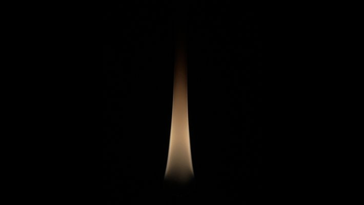 a flame on a black background
