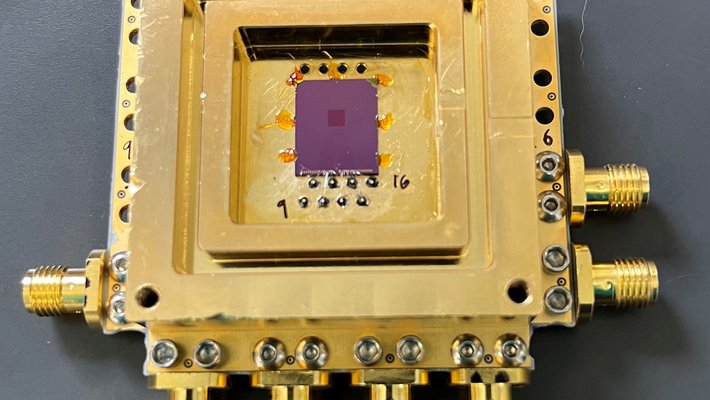 A picture of a gold, square quantum sensor from the study.