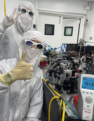 Masayuki Nakano and Torrey Cullen celebrate an engineering milestone at LIGO Livingston.