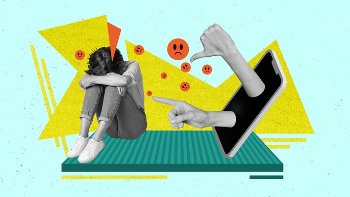 collage image of a young woman with her head on her knees opposite a smartphone or tablet with large hands reaching out, making shaming gestures.