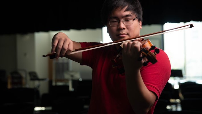 Wesley You playing the violin