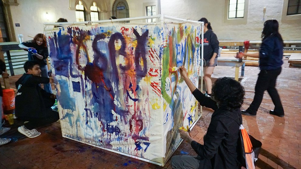 Students painting in Blacker House