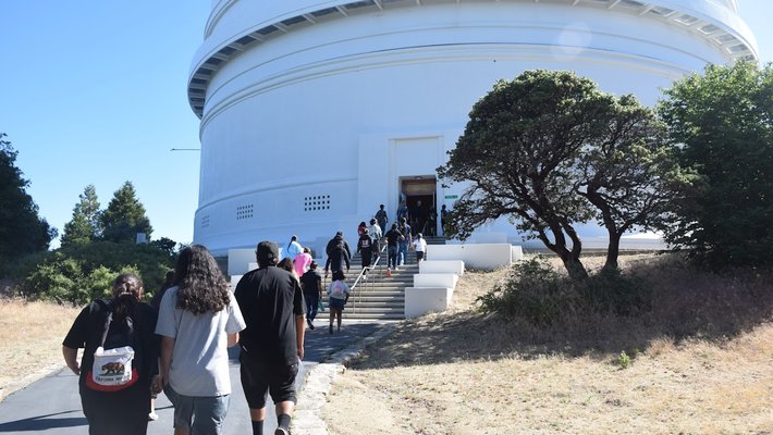 Pauma band members walk up to the 200-inch Hale Telescope