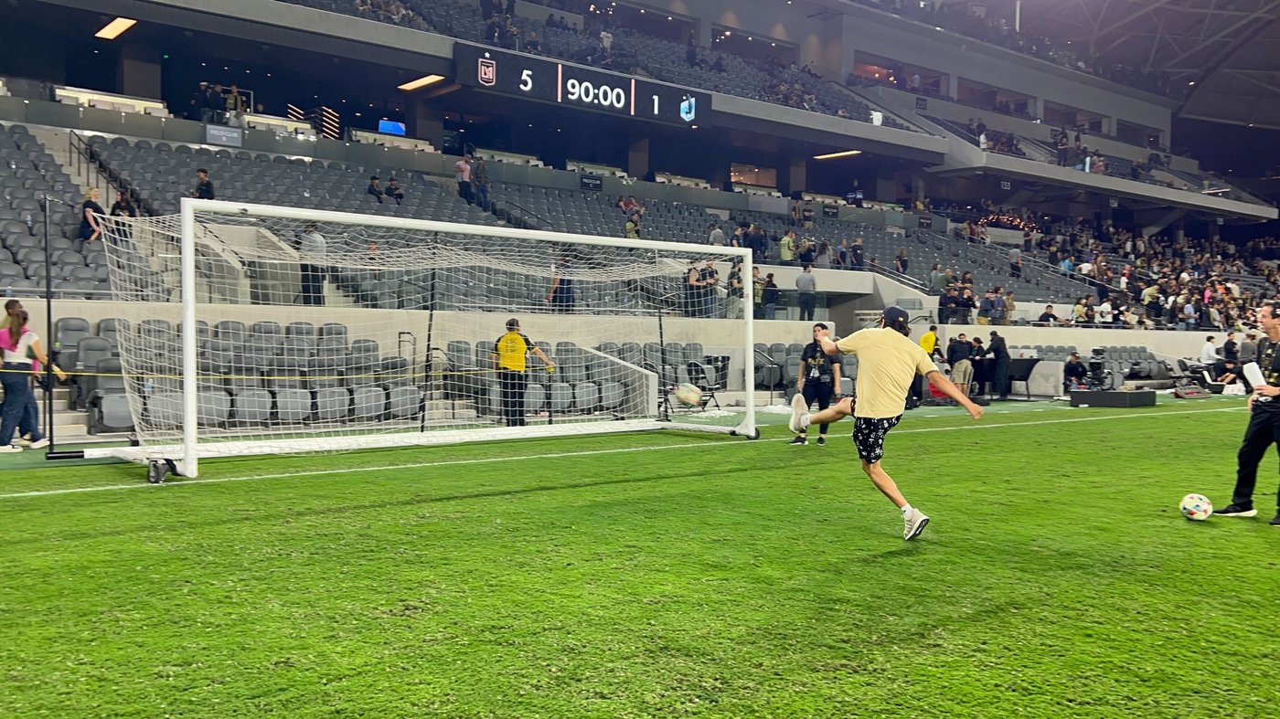 Second-year undergraduate Jacob Alderete takes a penalty kick on the field after the LAFC match