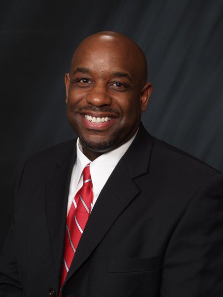 R. Darrell Peterson portrait, wearing suit and tie