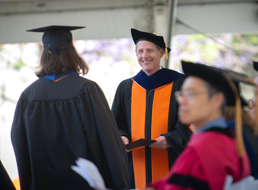 Thomas F. Rosenbaum wearing commencement regalia