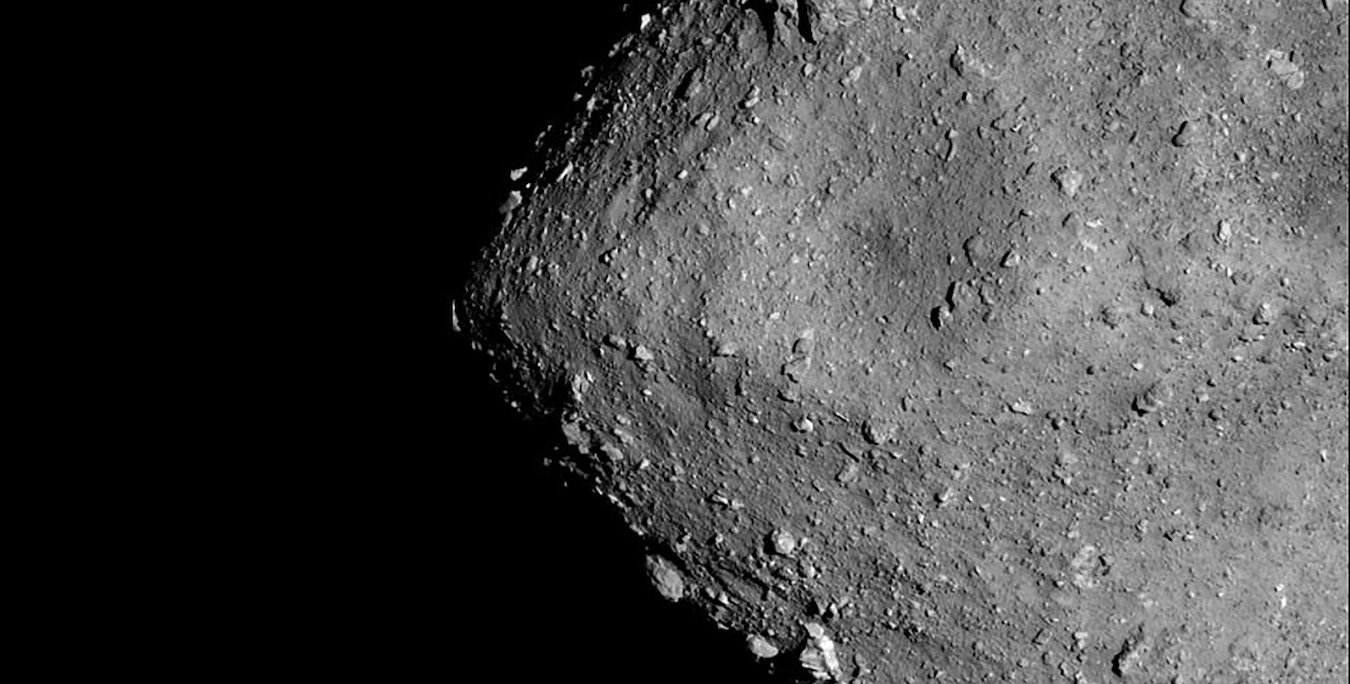 Black and white rocky image of asteroid Ryugu