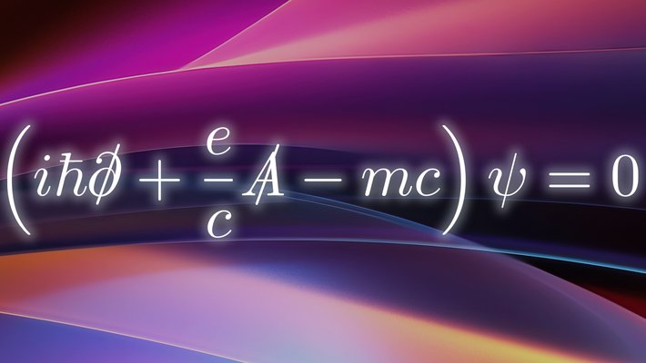 The text of the Dirac equation appears over a colorful background