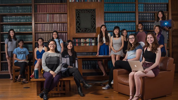 students sitting in a library